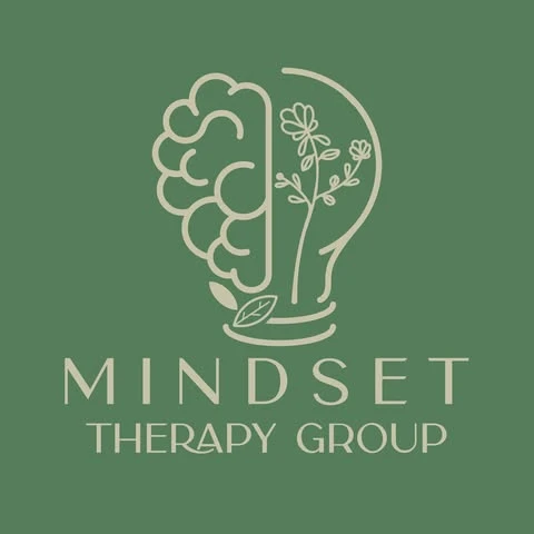 Logo de Mindset Therapy Group: una mente de la que crece una planta